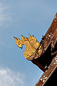 Chiang Mai - The Wat Phan Tao temple. Roof finals of the Wihan with the shape of stylished multi headed Naga.  